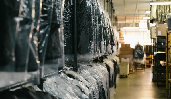 black suit hanging on rack